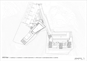 Topographic map showing architectural layout of buildings and parking areas.