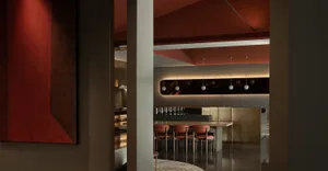 Modern, metallic bar with sleek, minimalist design.