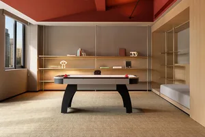 A modern game room featuring metallic furniture and a shuffleboard table.