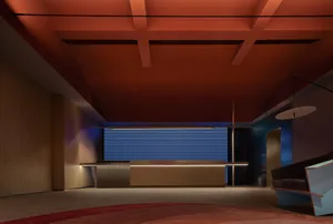 A modern lobby featuring concrete and tile materials.