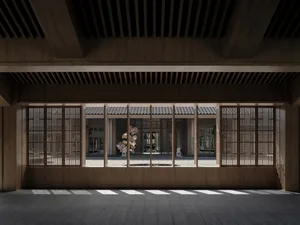 Industrial-style room with wooden frame and traditional Japanese architecture elements.