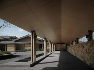Modern interior space with wooden surfaces and architectural elements.