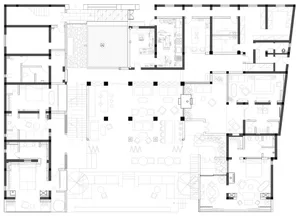 Detailed architectural floor plan depicting the layout of a commercial building, including offices, meeting rooms, and common