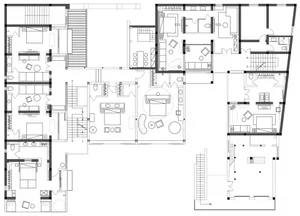 A detailed floor plan of a modern interior design featuring a large living room, kitchen, bedrooms, and bathrooms.