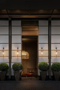 Modern hotel entryway featuring thermal concrete