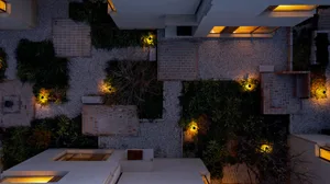 Top view of a modern industrial living space with concrete walls and floor.