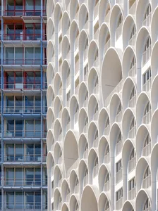 Modern glass building with repeating architectural features