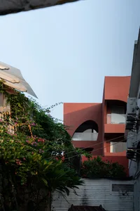 Modern residential building with concrete exterior.