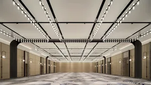 A spacious, modern conference room with minimalist design and contemporary lighting features.
