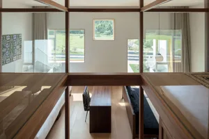 A minimalist living room with wooden elements.