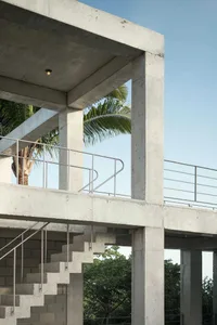 Modern architecture featuring concrete exterior with stairs.