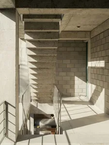 Modern indoor staircase constructed of concrete.