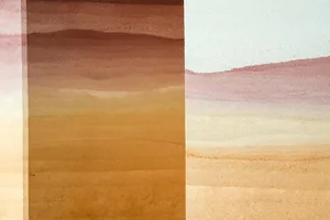 Layers of sand in varying shades representing different geological layers or times.