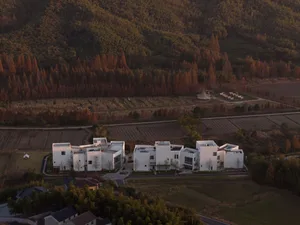A modern building constructed with white concrete.