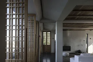 Modern interior design featuring wooden paneling with a minimalist and contemporary aesthetic.