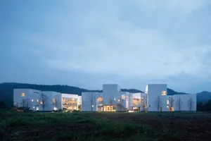 A modern residential community with white rendered stone exteriors