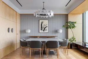 Modern dining room with wood and concrete materials