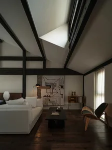 A modern living room with white furniture, dark wooden floors, and a geometric abstract painting on the wall.