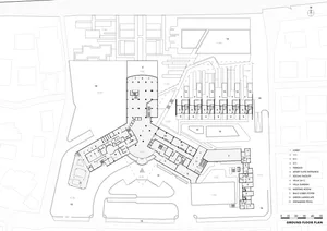 Modern building floor plan featuring ground level layout, rooms, and spaces.