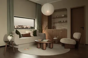 Modern living room featuring contemporary furniture and modern materials, with a large window offering natural light and a vi