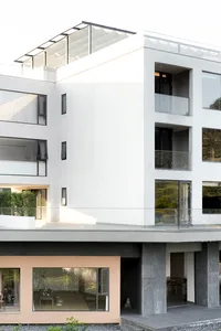 Modern building with concrete and glass materials.