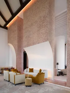 A modern living room featuring stained glass windows.