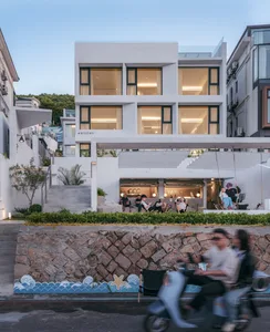 A modern architectural design featuring concrete materials.