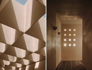 A minimalist building with concrete ceiling and geometric shapes