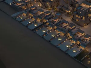 Clay or mud buildings with domed roofs illuminated at night