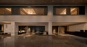 Modern hotel lobby featuring sleek marble construction and contemporary design elements.
