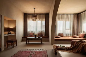 A modern residential interior featuring concrete and large windows with curtains.