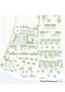 A detailed floor plan of a residential development showing various buildings, pathways, and green spaces.