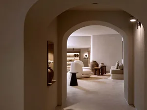 A modern spa interior with minimalist design and concrete walls and floors.