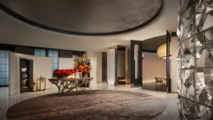 A modern lobby featuring furniture on marble floors