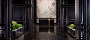 Modern hotel lobby with dark wood, glass, and concrete design elements.