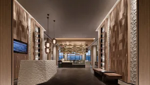 Modern restaurant hallway designed with marble and wood elements
