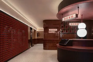 Modern retail cafe decorated with muted-toned tiles