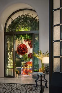 A beautifully arranged floral display in a retail storefront.