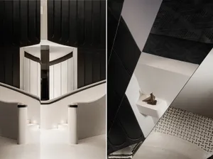 Modern staircase with a black and white color scheme featuring concrete treads and railings.
