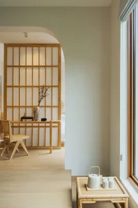 A minimalist residential space featuring wood elements.