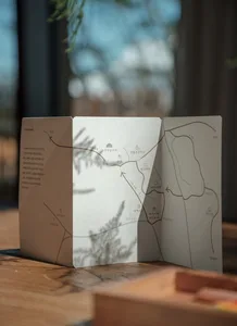 A trifold paper map of a town, with detailed annotations and guidelines for navigation.