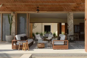 Contemporary living room featuring wooden furniture and comfortable seating.