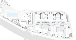 Floor plan of commercial housing units featuring concrete and glass materials.