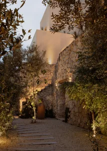 A modern architectural exterior made of stone.