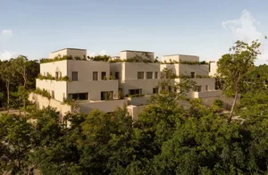 Modern residential home featuring concrete and glass terraces.
