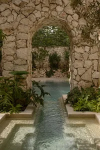 Luxury minimalist design stone swimming pool spa setting