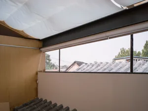 Metal windows with a minimalist design, viewed from an architectural perspective.
