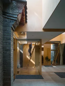 A modern interior design featuring wooden elements and minimalist aesthetics.