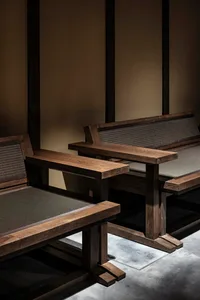 Modern, wooden furniture featuring minimalist design with dark wooden tones and matte finish.