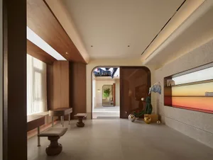 Modern lobby with wooden accents and glass elements